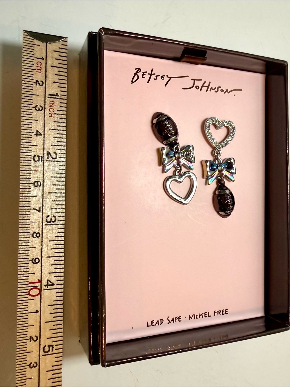 * Betsey Johnson Football and Silver Heart Bow Mismatch Drop Earrings